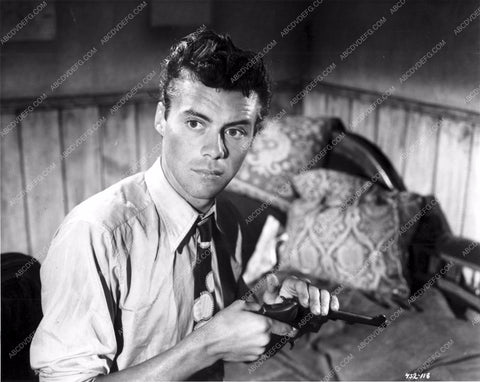 Dirk Bogarde loading a pistol film scene 8b20-7852