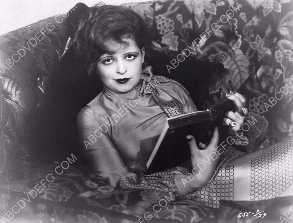 Clara Bow getting a little reading done 8b20-8326 – ABCDVDVIDEO