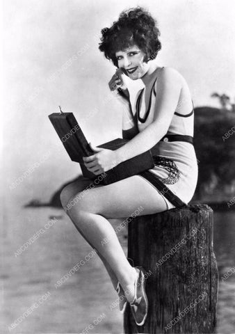 Clara Bow sitting on the pier doing a makeup touchup 8b20-8360