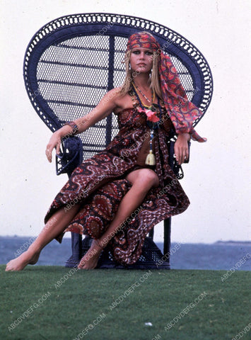 Brigitte Bardot in wicker chair 8b20-8662