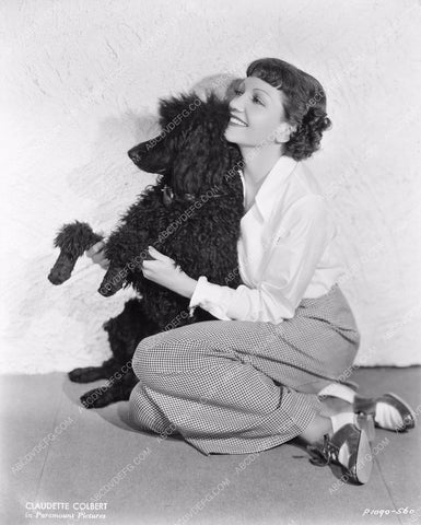 beautiful Claudette Colbert poses with her dog 8b20-8861