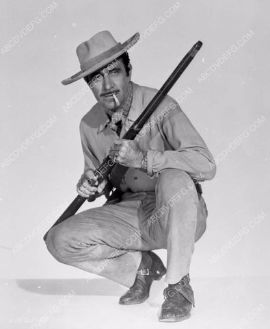 Gilbert Roland and his hunting rifle 8b20-9501