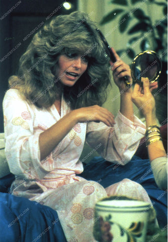 Farrah Fawcett brushes her hair 8b20-9579
