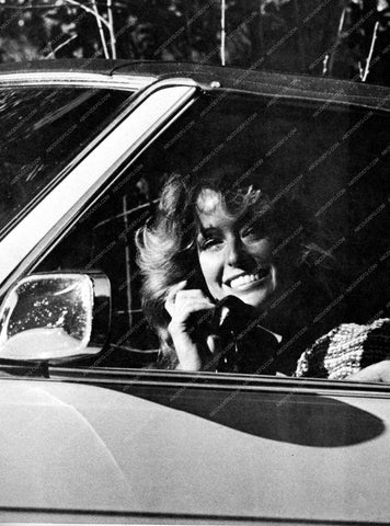 Farrah Fawcett on the telephone in the car 8b20-9645