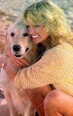 lovely Farrah Fawcett and her dog on the beach 8b20-9646