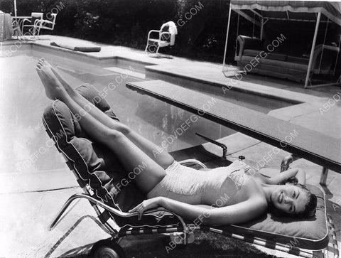 beautiful Gloria Gordon sunbathing with her toes pointed skyward 8b20-9709