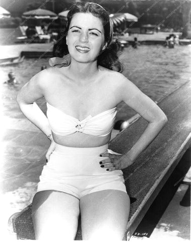 Faith Domergue in her bikini sitting on the diving board 8b20-9743