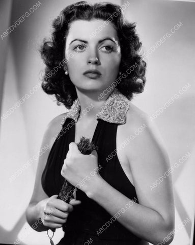 Faith Domergue and a hand fan 8b20-9753