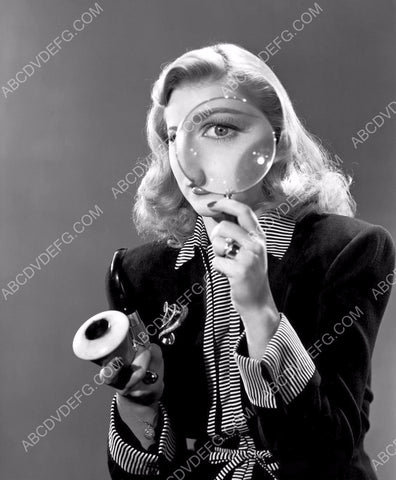 Ginger Rogers goes Sherlock Holmes with pipe & magnifying glass 8b20-9983