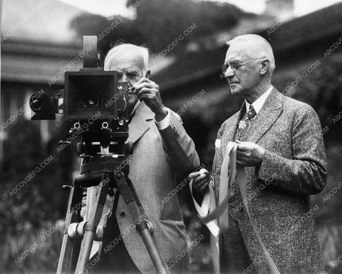 news photo George Eastman Thomas Edison playing with movie camera geast-07