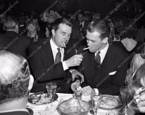 1946 Look Mag Awards Ray Milland James Stewart lighting each other lma1946-31
