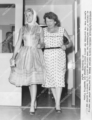 crp-00005 news photo Beverly Aadland (Errol Flynn fame) & mother leave court sex delinquency case crp-00005