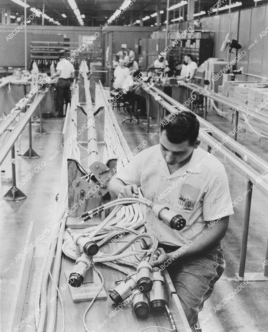 crp-028 1957 news photo military science Chrysler Corp tech electronic wiring harness for new missile system crp-028