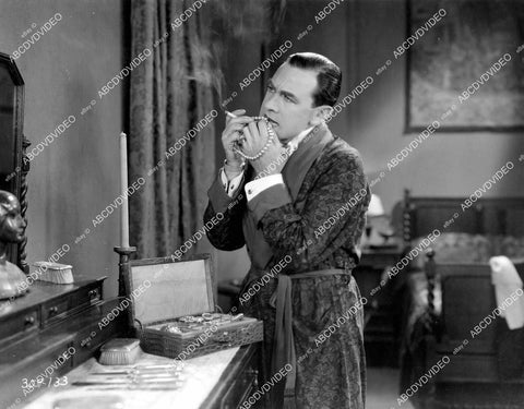 crp-10314 1927 Owen Moore tests stolen pearls on teeth silent film Becky crp-10314