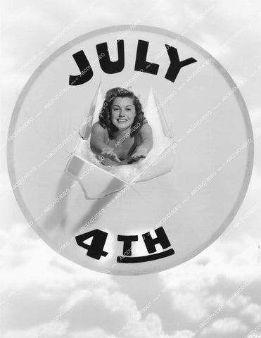 crp-10870 1940's Esther Williams diving through 4th of July banner crp-10870