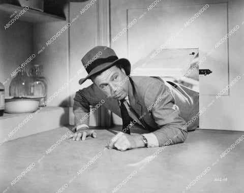 crp-11070 1951 Dick Powell climbing through the doggy door film You Never Can Tell crp-11070