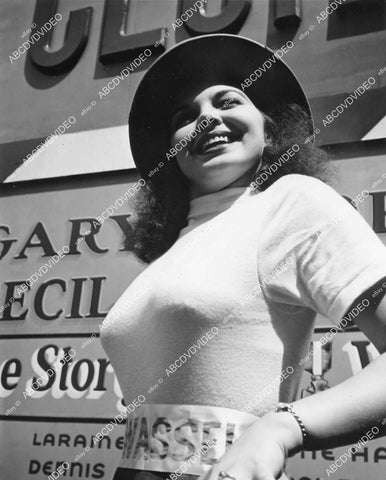 crp-11640 1944 news photo busty sweater girl Maria Monez wants to be noticed gets job as doorman on Broadway crp-11640