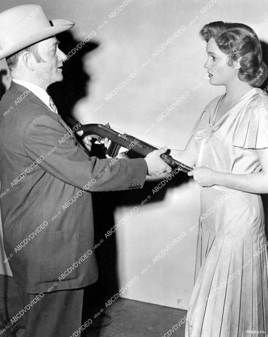 crp-11872 1952 gunsmith David Marshall Williams goes over gun safety w Jean Hagen film Carbine Williams crp-11872