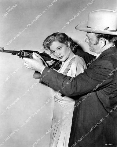 crp-11874 1952 gunsmith David Marshall Williams goes over gun safety w Jean Hagen film Carbine Williams crp-11874