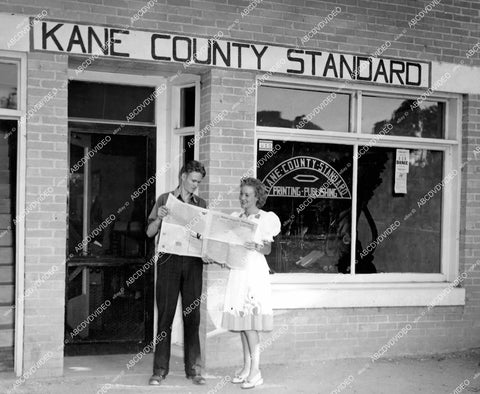 crp-11890 1943 Evelyn Keyes w Burnham Ford at local newspaper historic Hollywood filming location Kanab Utah crp-11890