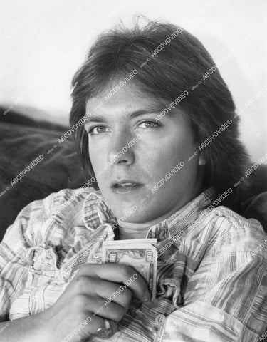 crp-01190 David Cassidy and a wad of hundred dollar bills crp-01190