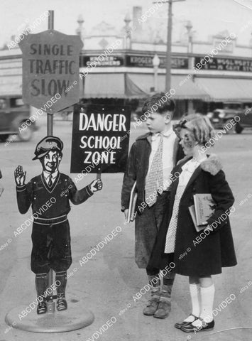 crp-01199 1935 two children in Chicago look at new safety signs for school zones crp-01199