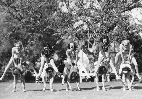 crp-12238 1936 cuties Jacqueline Daix, Mary Dees, Gay DeLys, Alice Jans, Edna Mae Jones, Jean Joyce, Geraldine Robertson, Ginger Wyatt, Jean Vernon playing leap frog at MGM crp-12238