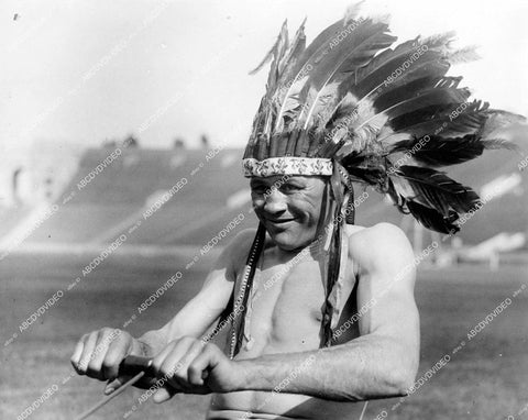 crp-12309 1930's boxer Johnny Adams in Native American Headdress exercises at Los Angeles Coliseum crp-12309