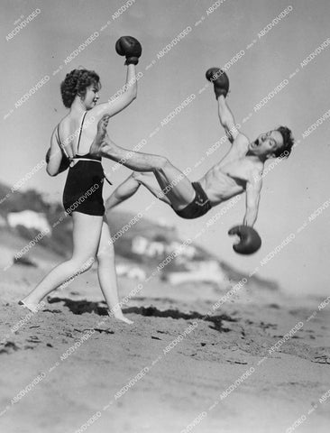 crp-12440 1935 boxing babe Nan Gray uppercuts Carl Conley out on the beach crp-12440