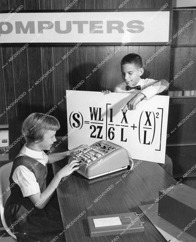 crp-13074 1960's kids feed math equations into adding machine computer crp-13074