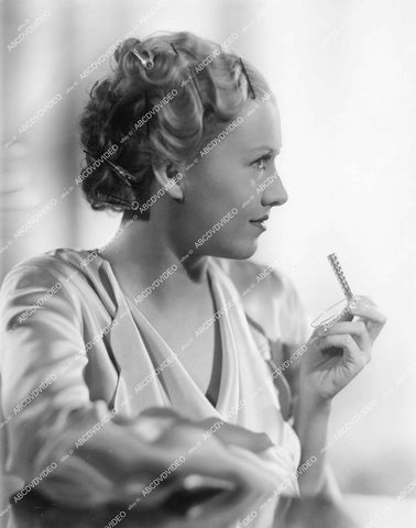 crp-13317 1930's Evalyn Knapp demos her wave curlers for her hair crp-13317