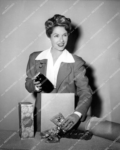 crp-13378 1943 Ann Savage prepares some gift baskets crp-13378