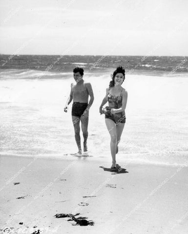 crp-13576 1957 James Darren, Joy Stoner in swimwear at the beach film The Tijuana Story crp-13576