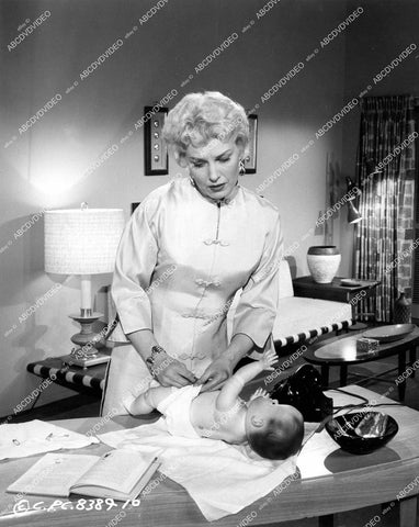 crp-13581 1957 Jean Willes practices changing diapers film The Tijuana Story crp-13581