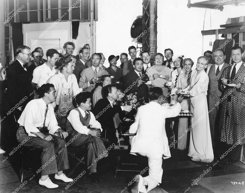 crp-13613 1935 candid Ann Harding birthday cake, James Wong Howe, Robert Montgomery, Edward Arnold, Una Merkel cast & crew film Biography of a Bachelor Girl crp-13613