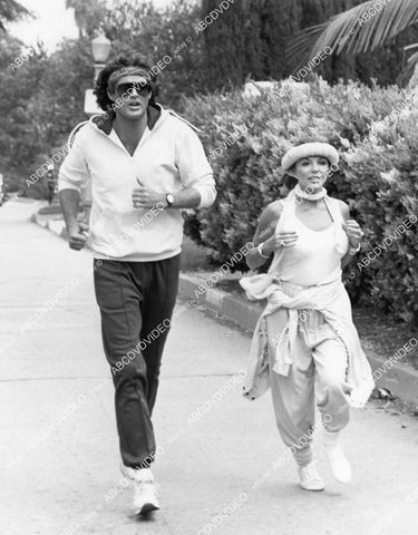 crp-01367 1984 David Hasselhoff, Joan Collins jogging away TVM The Cartier Affair crp-01367