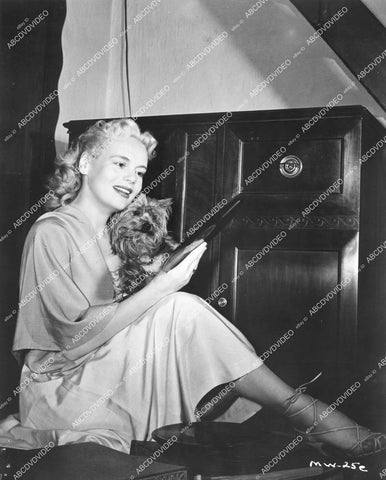 crp-13717 1952 beautiful original dumb blonde Marie Wilson w her terrier dog Hobbs at home crp-13717