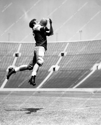crp-14265 1941 college football star Tom Harmon catching the ball film Harmon of Michigan crp-14265