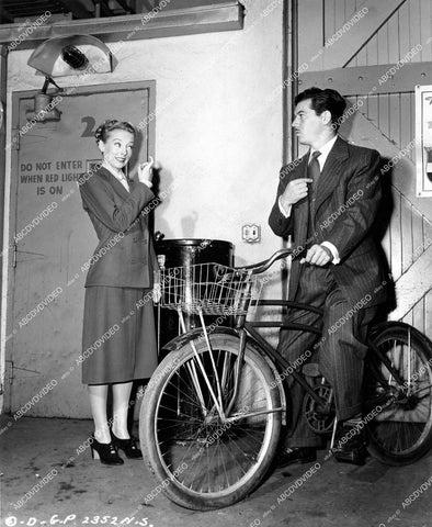 crp-14408 1948 Evelyn Keyes w Ron Randell on Columbia Studios' delivery bicycle film The Mating of Millie crp-14408