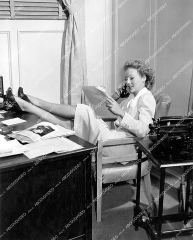 crp-14444 1943 Evelyn Keyes in publicity office to promo film The Desperadoes crp-14444