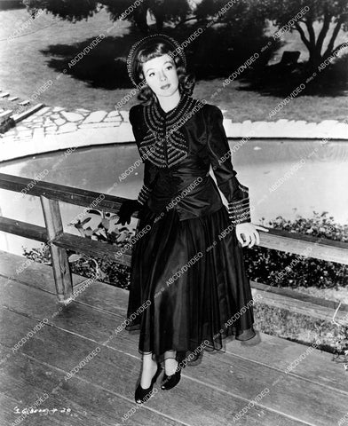 crp-14452 1949 news photo stunning Evelyn Keyes in new fashion Brocade Taffeta Cocktail suit by Helen Stepner crp-14452