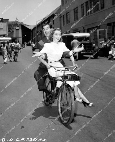 crp-15238 1947 Gloria Henry hitches bicycle ride Ron Randell Columbia Studios backlot crp-15238