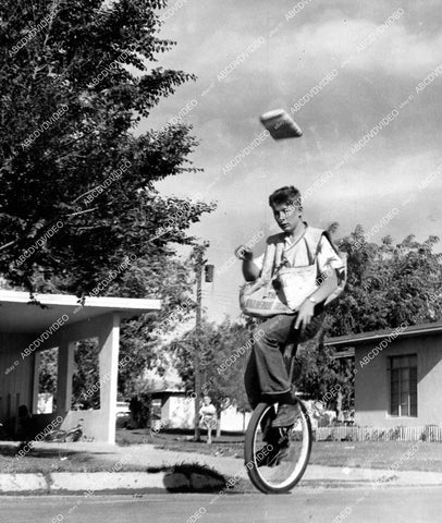crp-15394 1955 Tom Moffatt paper boy in Albuquerque uses unicycle to deliver newspapers crp-15394