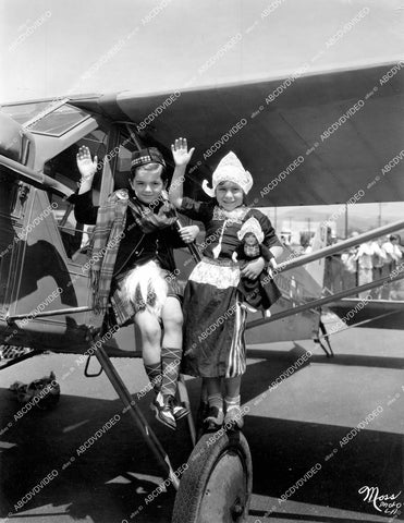 crp-15411 1930's cute kids Patricia Ann Wright & Jack Denehie on airplane in traditional Scottish & Dutch garb crp-15411