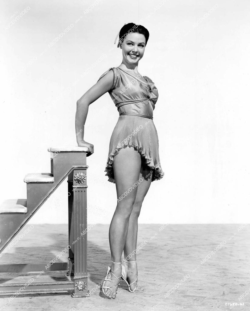 crp-15587 1954 cutie Jane Fischer in short skirt shows off legs