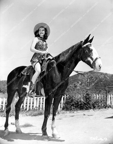 crp-15744 1940 cute cowgirl Peggy Diggins in swimwear & cowboy boots on horseback crp-15744