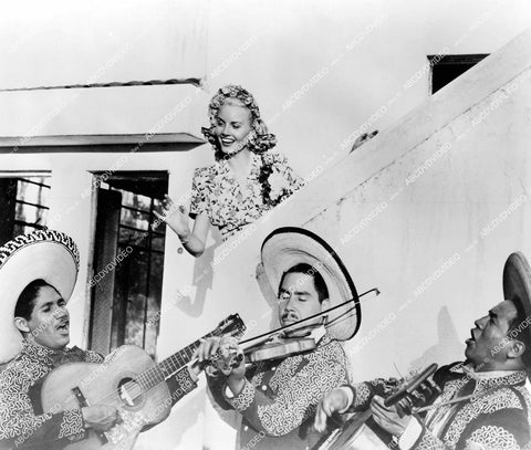 crp-16504 1945 Janet Blair w Mexican mariachi band Xechimilco film Tonight and Every Night crp-16504