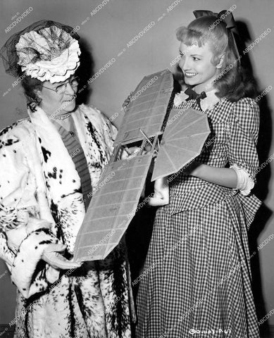 crp-16530 1946 Janet Blair & Mrs Regina Cleary Montgomery & aviation model of John Montgomery's glider airplane film Gallant Journey crp-16530