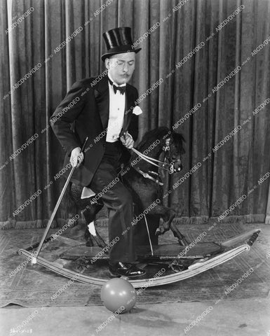 crp-17475 1928 Lew Cody on a rocking horse silent film Beau Broadway crp-17475