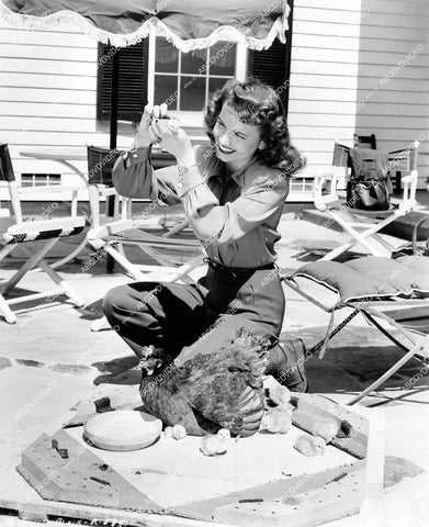 crp-17802 1945 Janet Blair at home w her chickens and eggs crp-17802